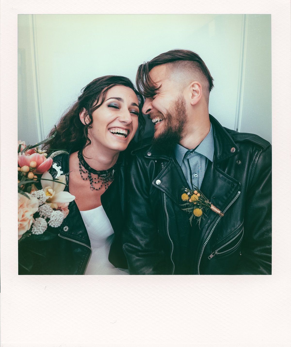 Guests posing and interacting at a photo booth